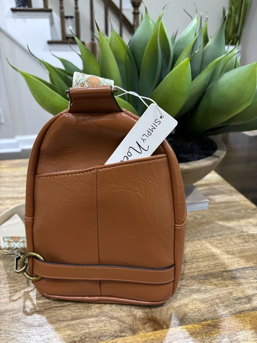 Crossbody Backpack with Patterned Strap